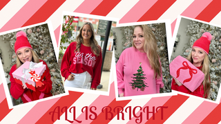 4 women wearing Christmas sweaters