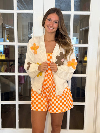 Cream colored Cardigan with brown and orange flowers
