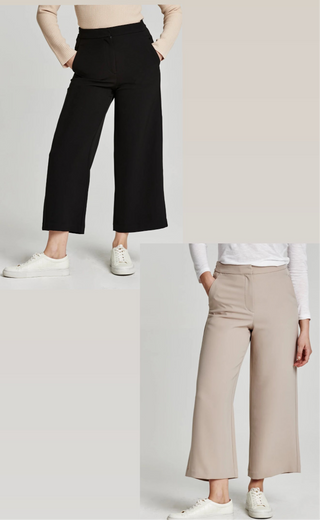Two Women wearing pants, one is black and one is beige