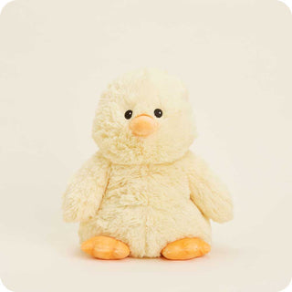 A plush stuffed animal chick with a yellow-colored body, black eyes, a orange beak, and orange feet.