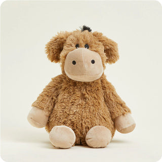 A plush donkey that is microwavable and weighted for comfort, filled with natural grains and French lavender.