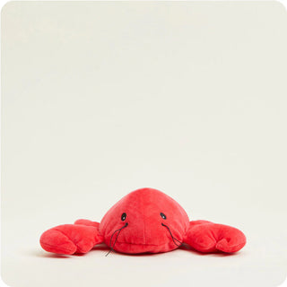 A red plush lobster with black eyes, designed as a warmie for microwaving.