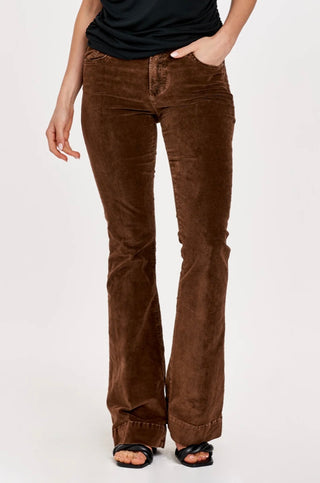 A pair of high-waisted, flare leg brown velvet pants with a wide hem opening.
