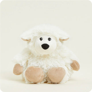 A plush sheep with white fur and beige accents for hooves and face details, designed to be microwavable for warmth.
