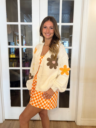 Cream colored Cardigan with brown and orange flowers