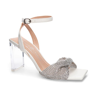 White heels with rhinestone bow and clear square heel