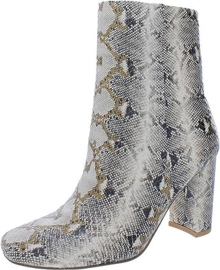 Snake skin boots with hints of gold.