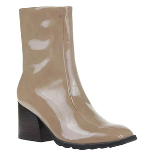 A pair of brown, square round-toe, low-heeled boots with a glossy finish.