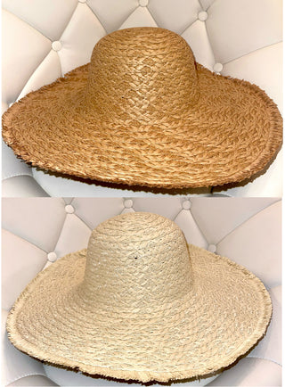 Two solid floppy sun hats, one displayed in front and the other in profile, both with a beige color and made of paper.