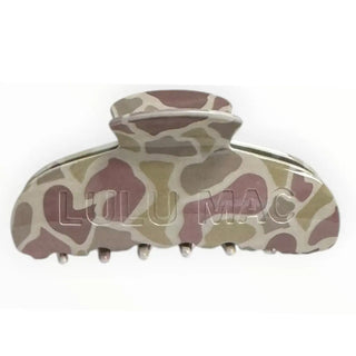 Camouflage-patterned hair clip with 'Lulu Mac' branding on a white background