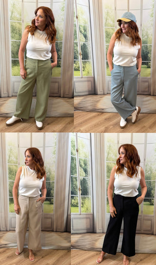 Woman wearing a white top and different colored pants in four different poses.