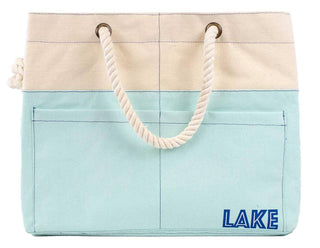 Tote bag with 'LAKE' branding on a white background