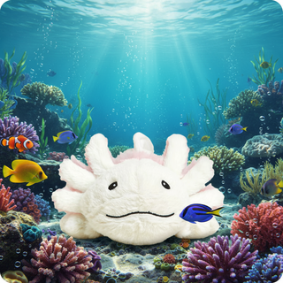 Plush white axolotl Warmie under the sea