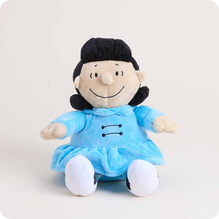 Plush toy with black hair and a blue dress on a white background