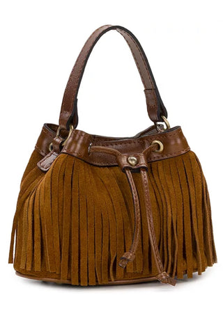 A brown suede fringe handbag with dark brown leather trim, dual top handles, and a drawstring closure, shown against a plain white background.
