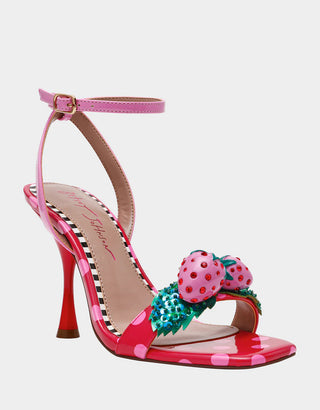 Pink and Red high-heeled sandal with strawberry design on a white background