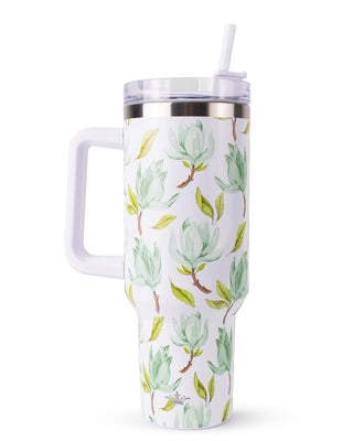Tumbler with a leaf pattern on a white background