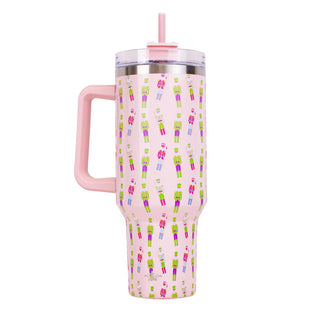Pink tumbler with a pattern and handle on a white background