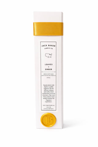 White box with gold ribbon and gold accents with ‘JB’ stamp