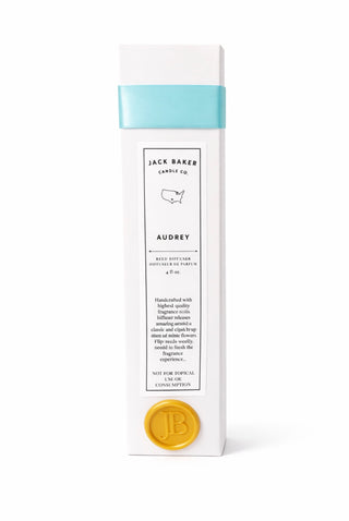 White box with blue ribbon and gold accents 