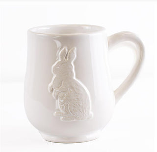 White ceramic mug with a rabbit design on a white background