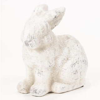 White textured rabbit figurine on a white background