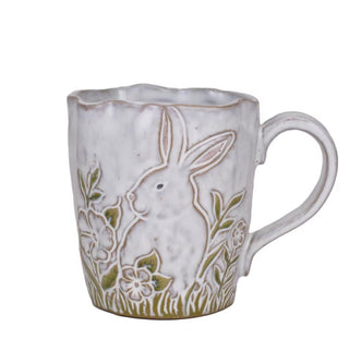 Ceramic mug with a rabbit design on a white background