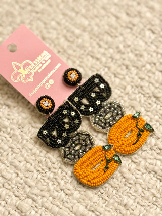 A pair of beaded "BOO" earrings