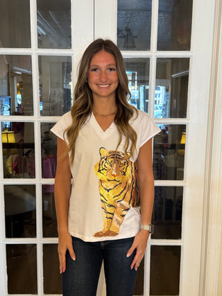 White V-neck shirt with sequins lion, front and body wraps to the back