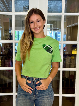 Green cropped T-shirt with sequins green football on left side￼
