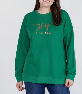 Green sweatshirt with the saying “joy to the world” in gold sequin