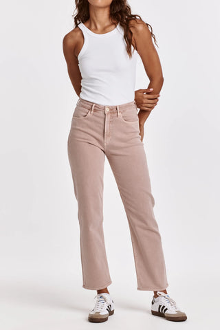 Person wearing a white tank top and pink pants on a white background