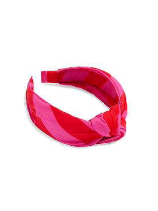 Pink and red striped headband on a white background